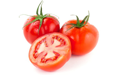 Fresh red tomatoes isolated on white