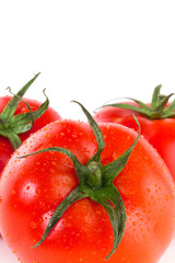 Fresh red tomatoes isolated on white