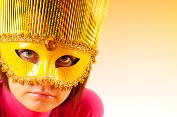 Attractive woman posing in the stylish mask