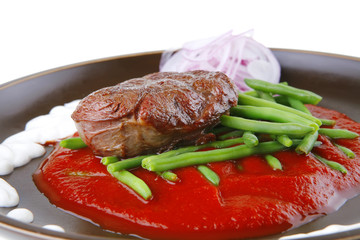 beef meat on red sauce