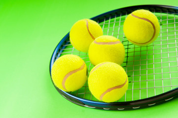 Tennis concept with balls and racket