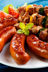 Grilled meat, sausages and vegetables