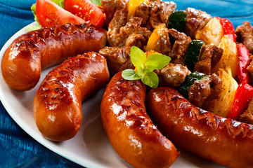 Grilled meat, sausages and vegetables