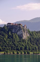 Fototapeta na wymiar The castle at the cliff above lake Bled in Slovenia