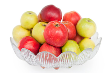 Apples in vase isolated on white background