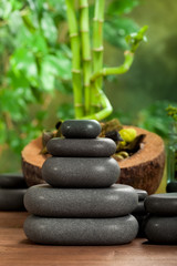 Obraz na płótnie Canvas Spa massage - black stones