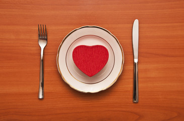 red heart on a white plate