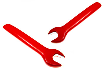 Two Red adjustable spanner