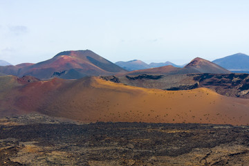 Fototapeta na wymiar Vulacanic landscape of ( Montains of Fire ) ,in Lanzarote Island