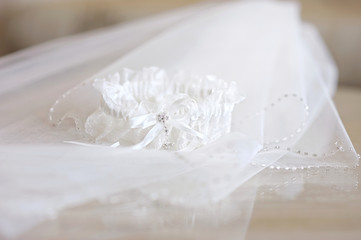 Beautiful wedding veil and a garter