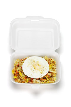 Fried rice with egg in open Styrofoam box