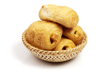 pasties with sausages in wattled basket