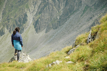 Naklejka na ściany i meble Girl on the top of the mountain, Fagaras mountains, Romania