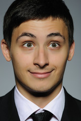 Portrait of HAPPY business man in formal suit and black tie . ex