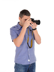 Fototapeta premium professional male photographer taking picture . isolated on whi