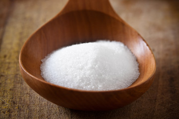 Salt on wooden spoon