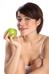 Beautiful Japanese woman with green apple fruit