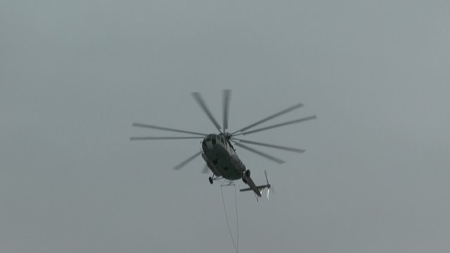 Helicopter escaping bad weather