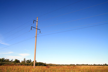 electric pole on autumn field