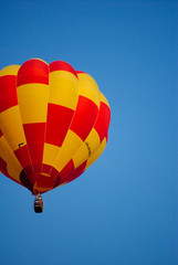Colorful balloon on blue sky.