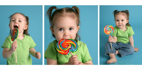 Cute baby eating a lollipop treat