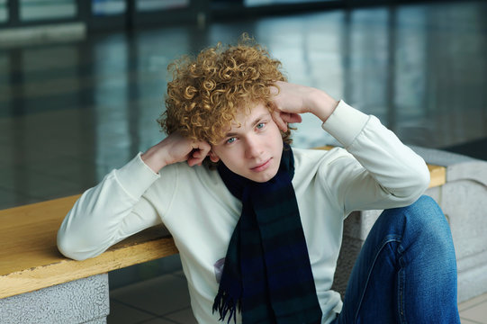young man with curly hair