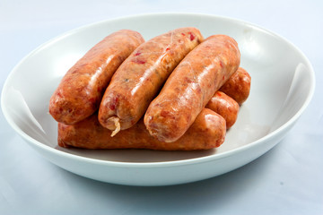 A stack of sweet chilli sausages