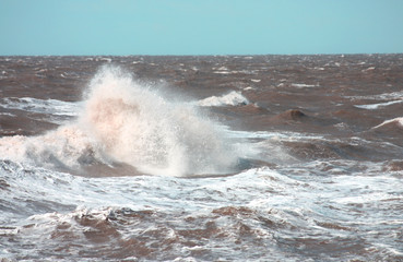 Large Waves Breaking in a Rough Sea.