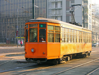 Old orange tram in Milan, Italy