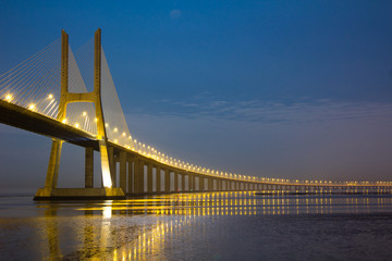 Vasco da Gama bridge under moonlight