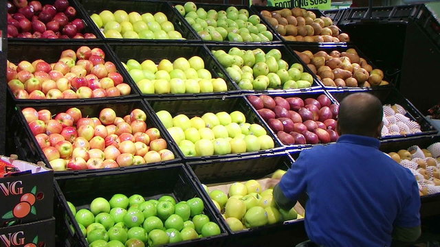 Man Facing Apples In Produce 03