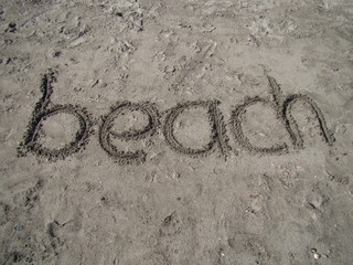 Schriftzug am Strand