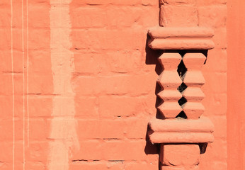 decorative element on brick wall