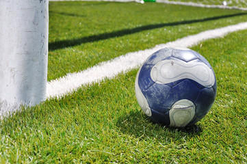 Fototapeta na wymiar Soccer ball on the grass field