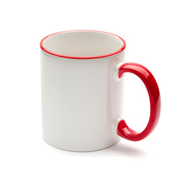 white mug with red handle