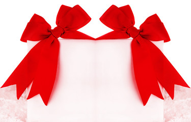 Beautiful red bows over blank card