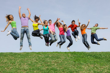 group of happy kids or teens jumping - 29316894