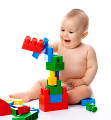 Little boy with building bricks