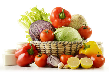 Composition with variety of raw vegetables isolated on white
