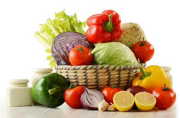 Composition with variety of raw vegetables isolated on white