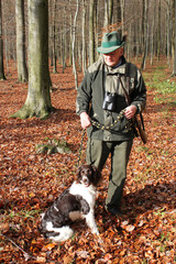 Jäger mit Jagdhund