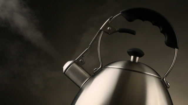 Tea kettle with boiling water