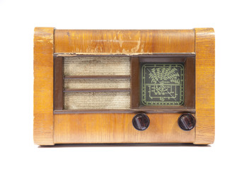 Old wooden radio isolated on white