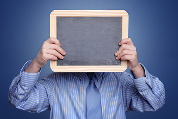 Person mit Tafel