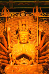 Thousand hands of god image make of wood carving in chinese temp