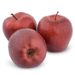 Wet red apples isolated on white