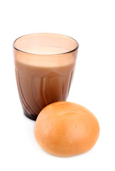 Milk and loaf isolated on white