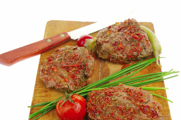 roasted spicy meat over white