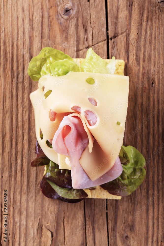 Poster crisp bread with cheese and ham