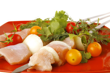 fresh chicken kebabs on plate